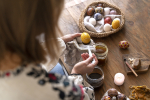 woman-decorating-easter-eggs