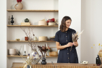 smiley-woman-working-with-flowers-front-view